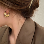 Elegante ovale Ohrstecker in 3D-Optik
